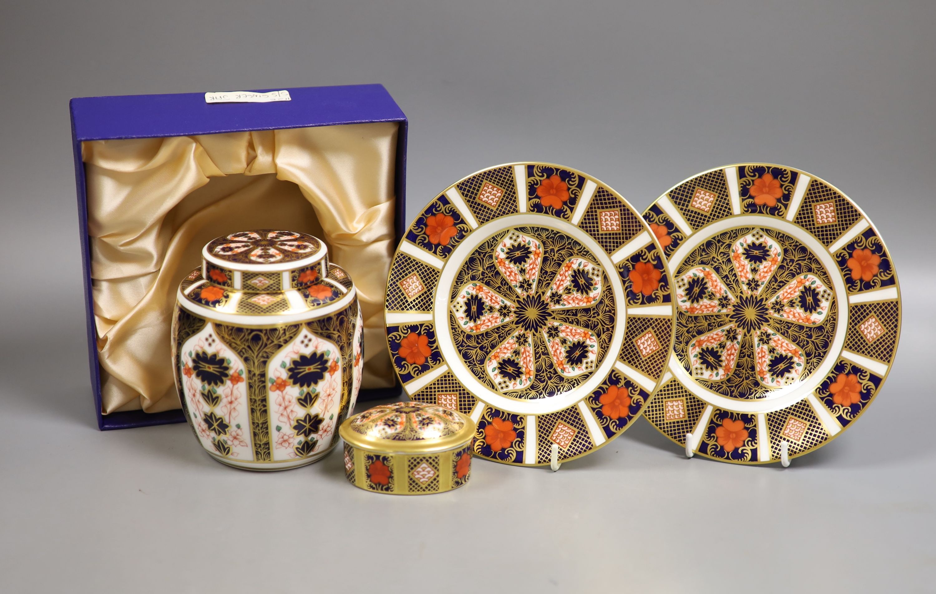 A Royal Crown Derby 'Old Imari' pattern ginger jar and cover, boxed, two similar small plates and a trinket box